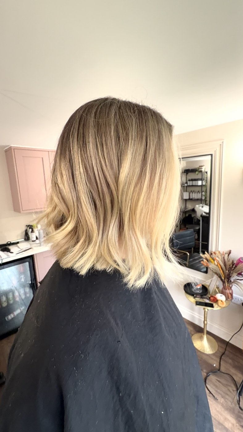 Blonde bob with natural root depth by Selina at The Room